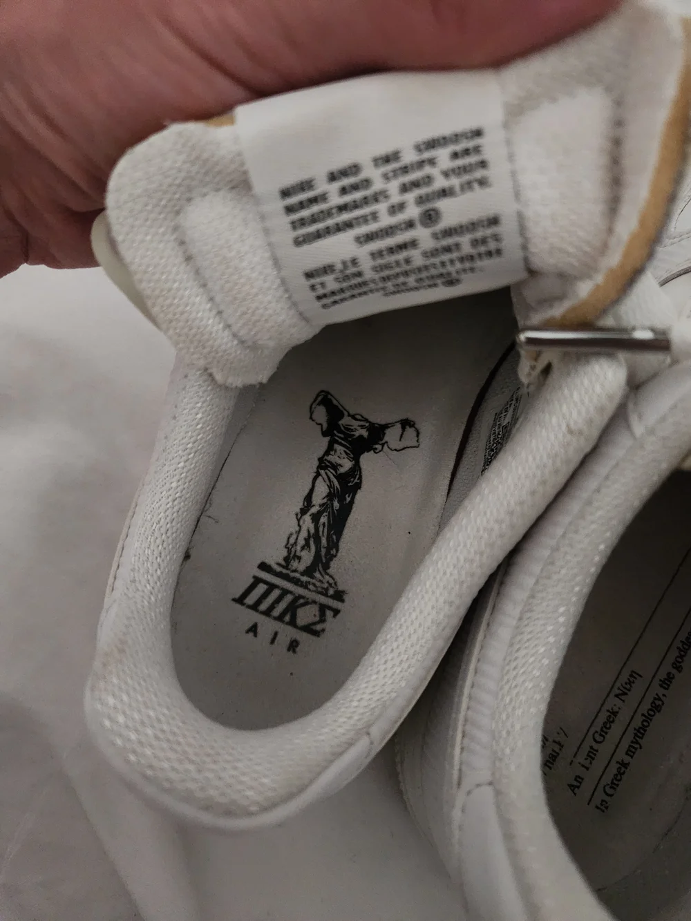 Nike White Leather Low-Top Sneakers with Mesh Tongue